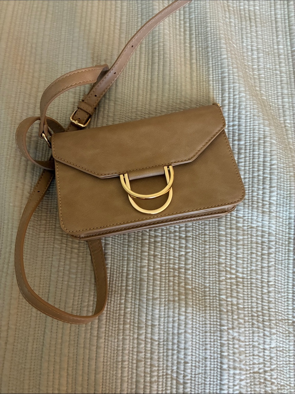 Stylish Tan Crossbody Bag with Gold Accent Hardware